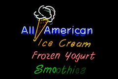 a neon sign, advertising ice cream, frozen yogurt, and smoothies