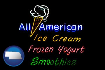 a neon sign, advertising ice cream, frozen yogurt, and smoothies - with Nebraska icon