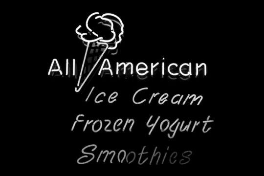 a neon sign, advertising ice cream, frozen yogurt, and smoothies